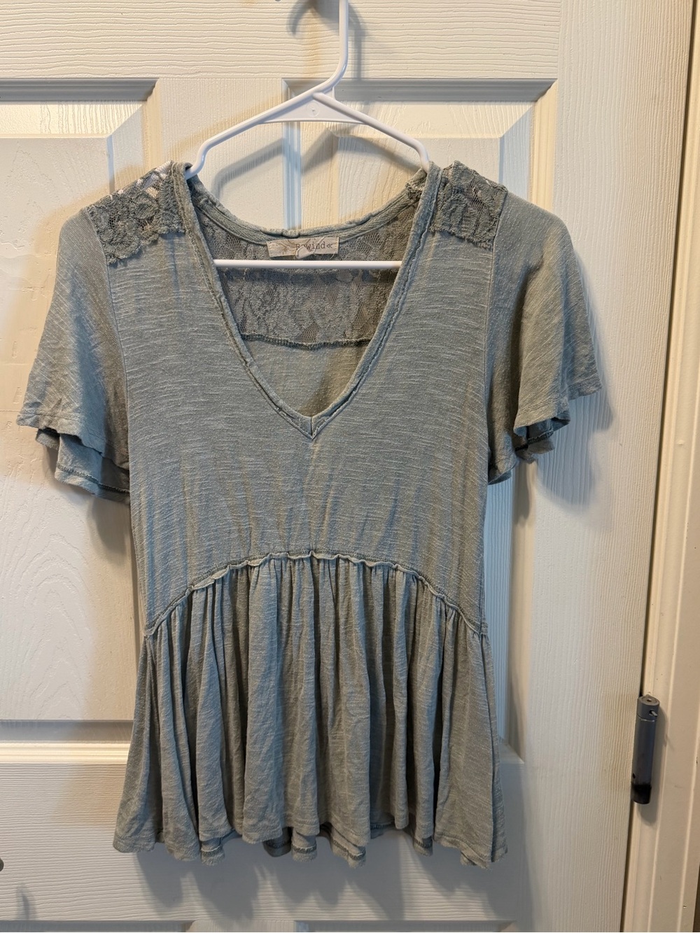 Rewind V-Neck Peplum Tunic in Sage Green with Lace Shoulders
